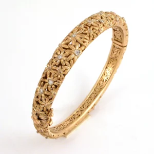 Bracelet - Florentine style - in yellow gold - the first flower